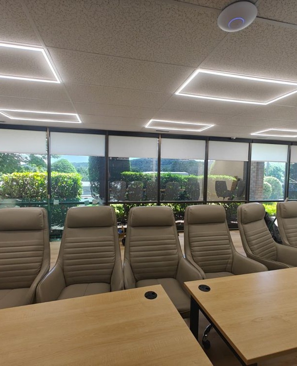 Roller shades in a conference room